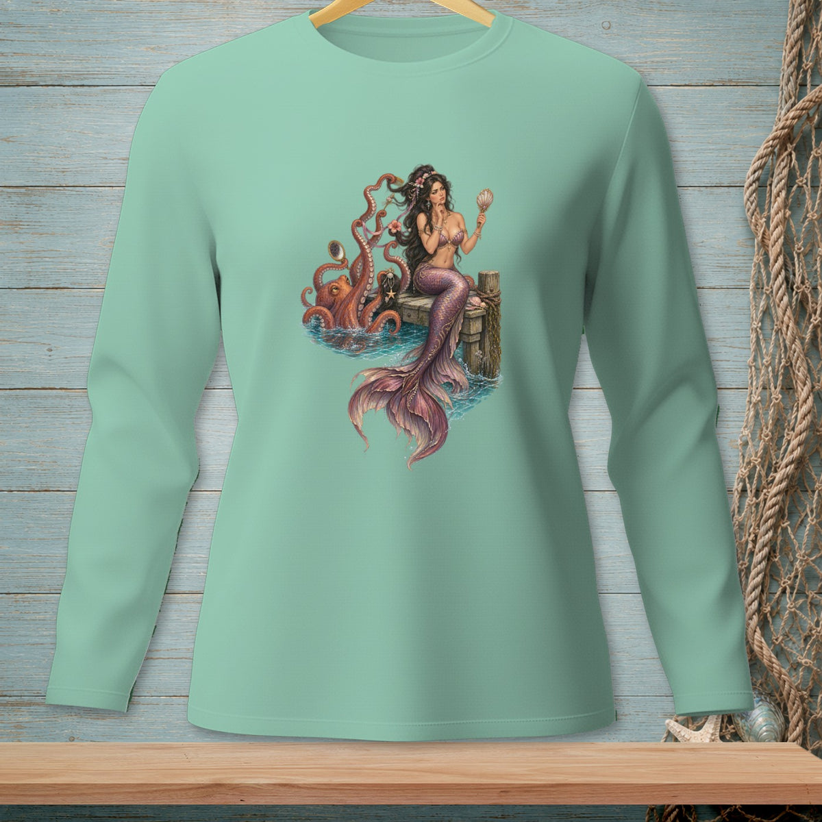 Mermaid holding seashell with octopus on wooden dock.