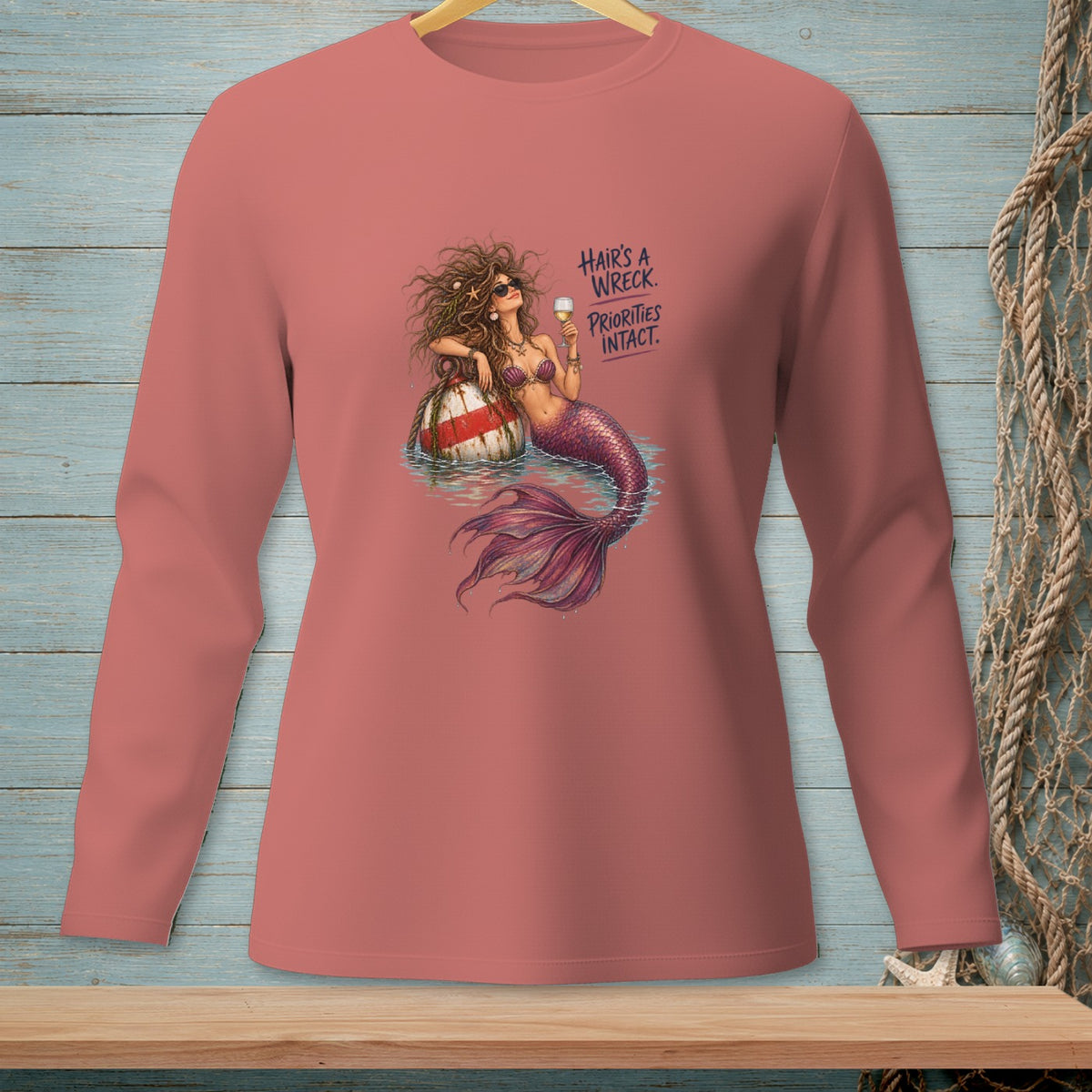 Mermaid with wine glass rests on buoy, "Hair's a wreck. Priorities intact."