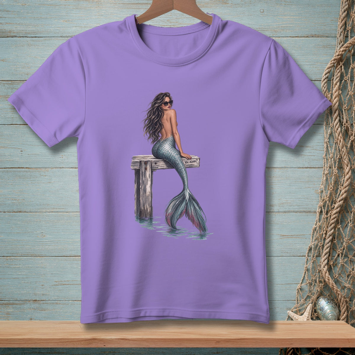 Purple t-shirt with a mermaid sitting on a pier with sunglasses and text "YOU AGAIN?"