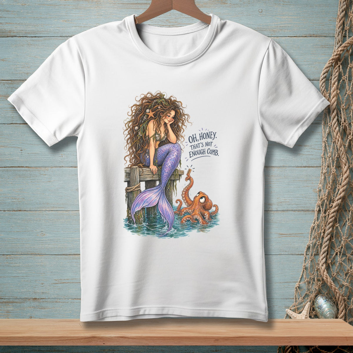 Mermaid sitting on dock with octopus and text "OH, HONEY. THAT'S NOT ENOUGH COMB."