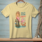 Yellow t-shirt featuring a cartoon mermaid and crab with the text "TALK TO THE TAIL, CRABCAKE."