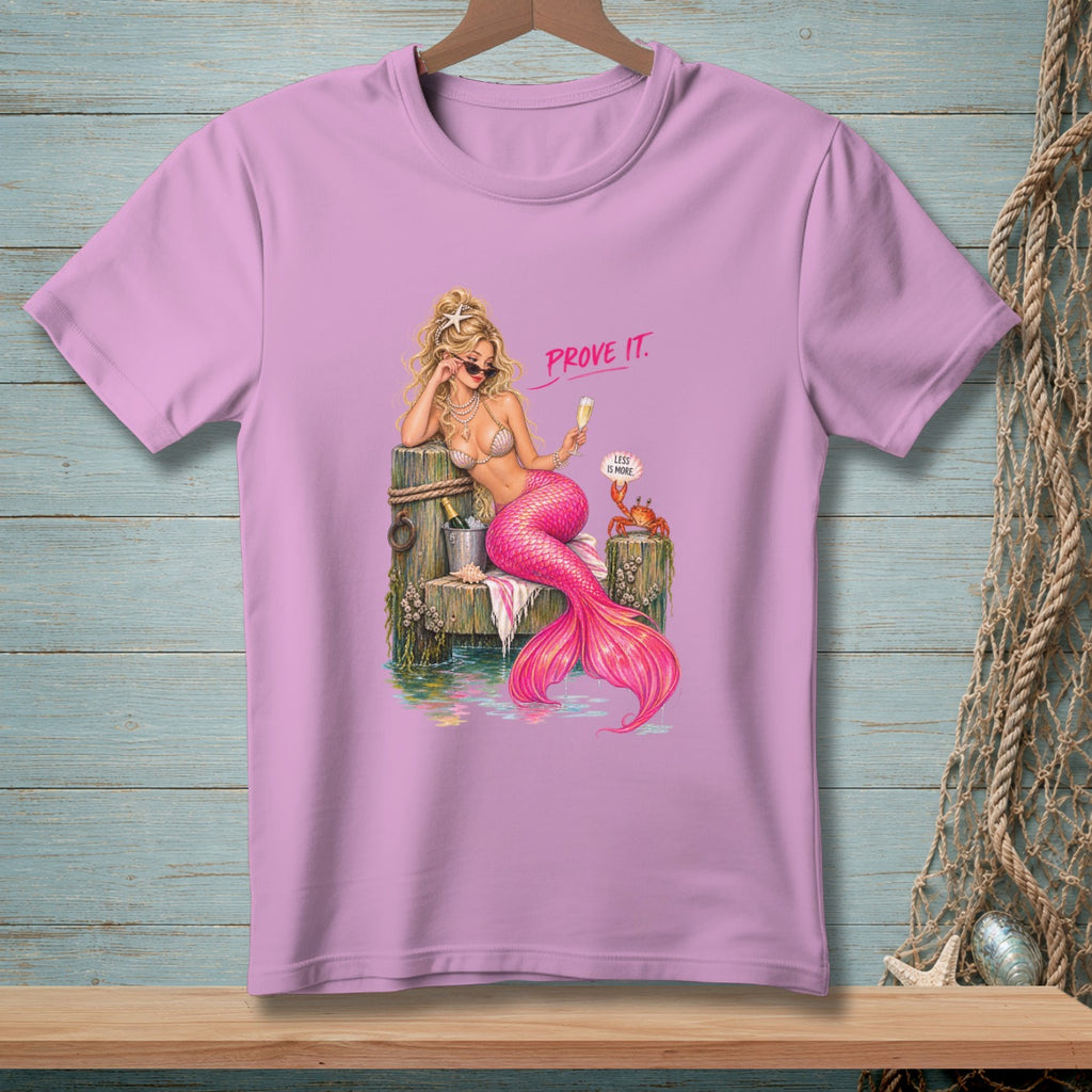 Pink t-shirt featuring a blonde mermaid with a pink tail saying "Prove It."
