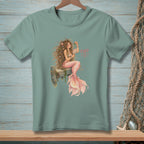 Mint green t-shirt with a watercolor illustration of a mermaid and the text "FIXED IT".