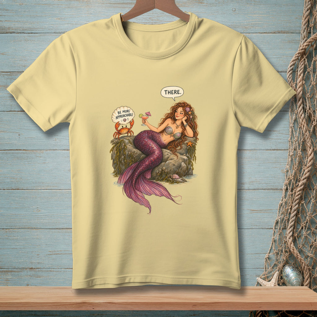 Mermaid with pink tail drinks cocktail while crab says "Be More Approachable" and she replies "There."