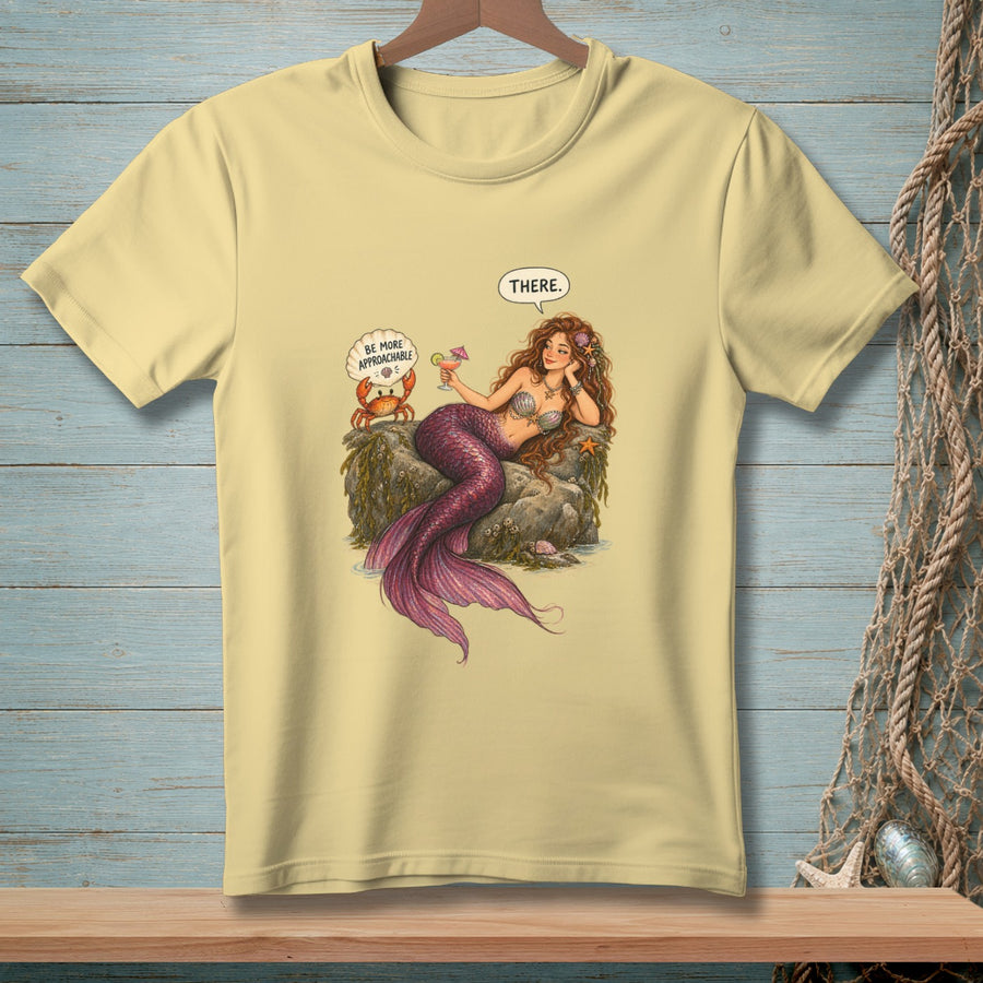 Mermaid with pink tail drinks cocktail while crab says "Be More Approachable" and she replies "There."