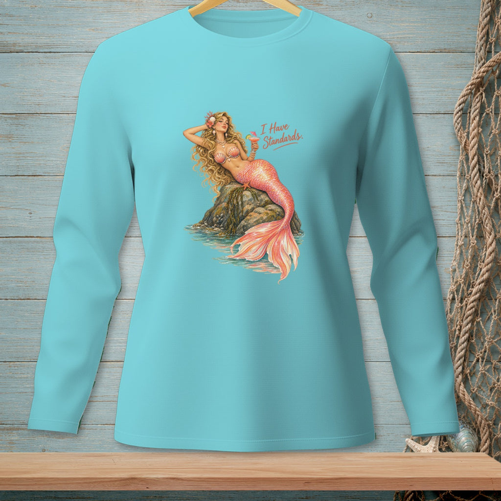 Turquoise long-sleeve shirt with mermaid graphic and text "I Have Standards."