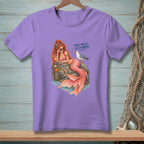 Mermaid wearing sunglasses and holding a drink, with a seagull and text.