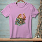 Mermaid with octopus and seashell mirror on rocks.