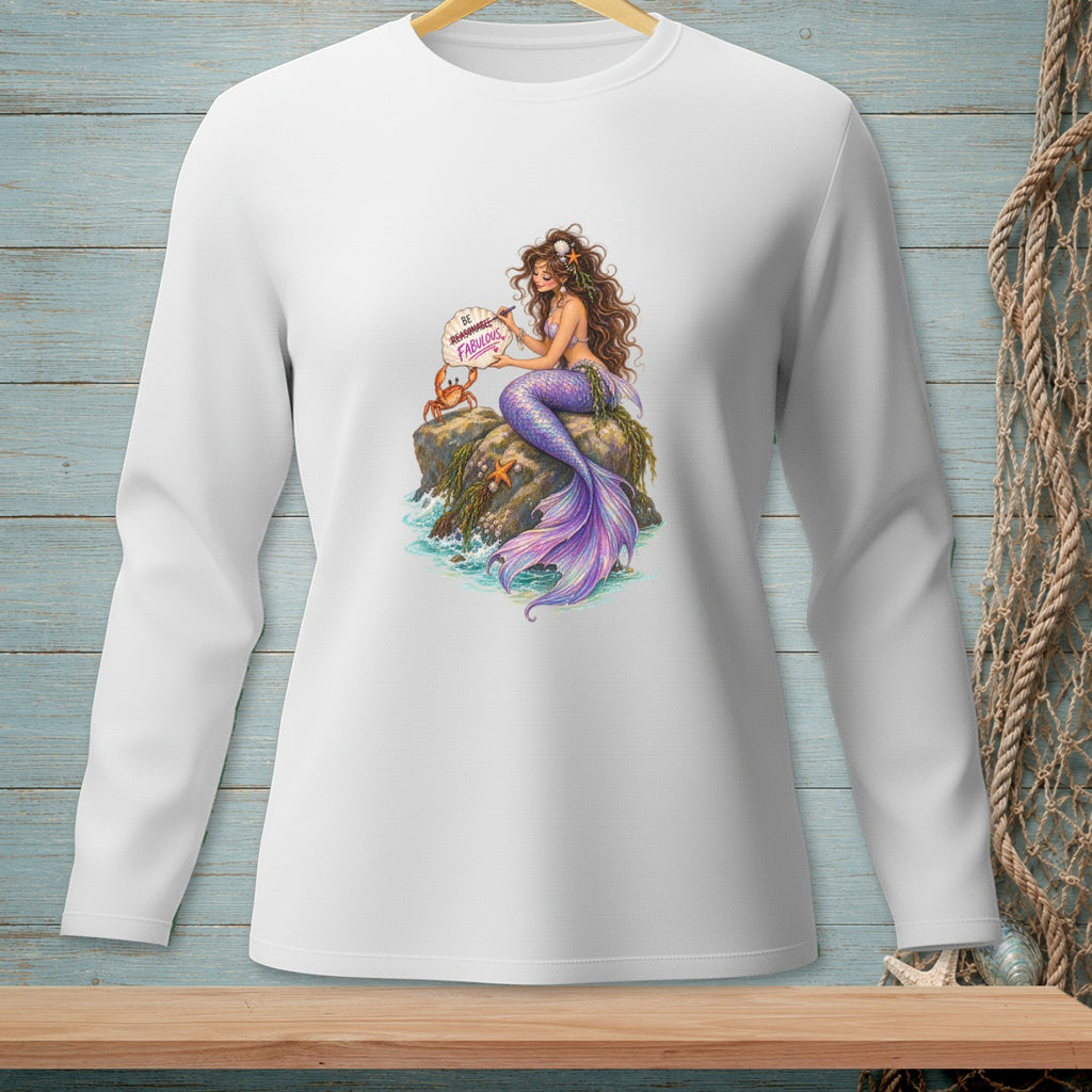 Mermaid with purple tail sitting on a rock holding sign that says "Be Reasonable Fabulous".