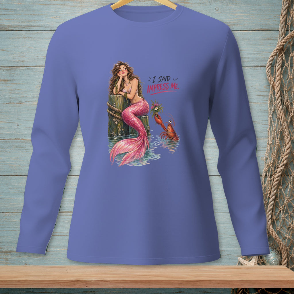 Mermaid sitting on a post with a lobster and the text "I SAID IMPRESS ME."