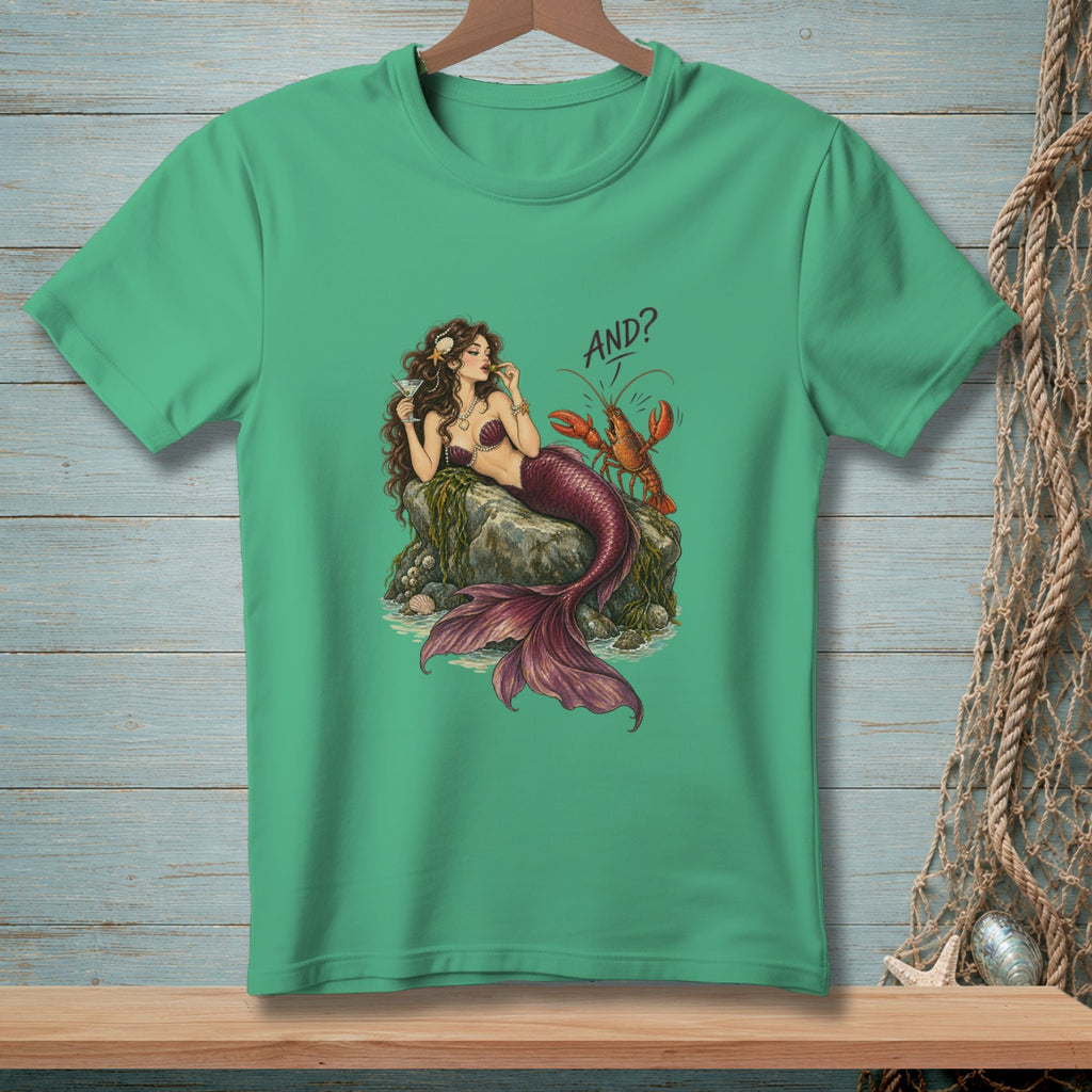 Mermaid and lobster graphic with "AND?" text on a green t-shirt.
