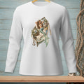White long-sleeve shirt with a graphic of a mermaid lounging in a boat with flowers and books.