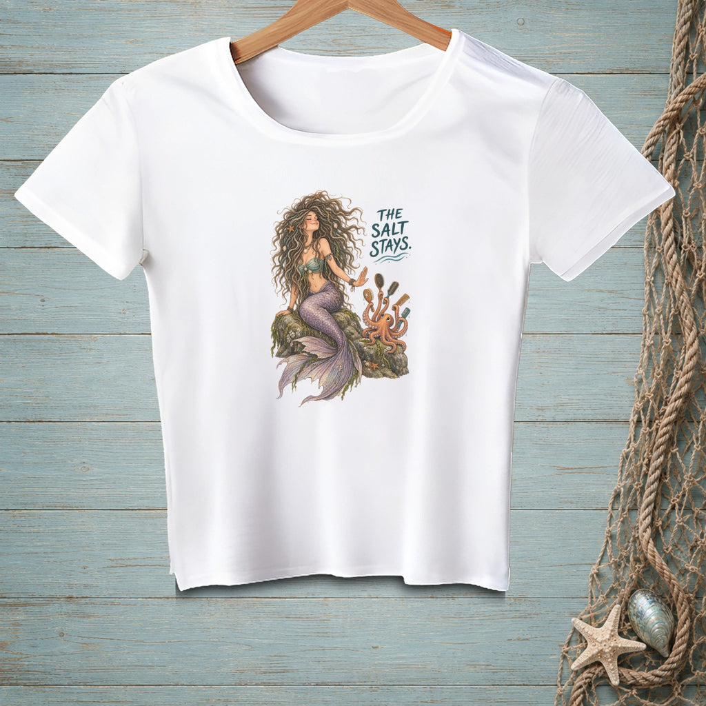 White t-shirt with a mermaid, octopus, and text "The Salt Stays."