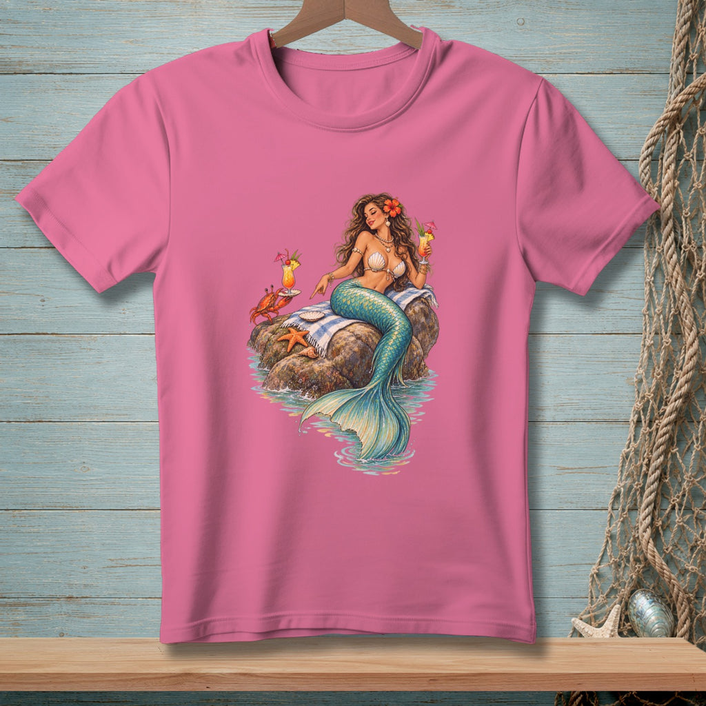 Pink t-shirt featuring a mermaid with drinks, a crab, and starfish on rocks.