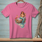 Pink t-shirt featuring a mermaid with drinks, a crab, and starfish on rocks.