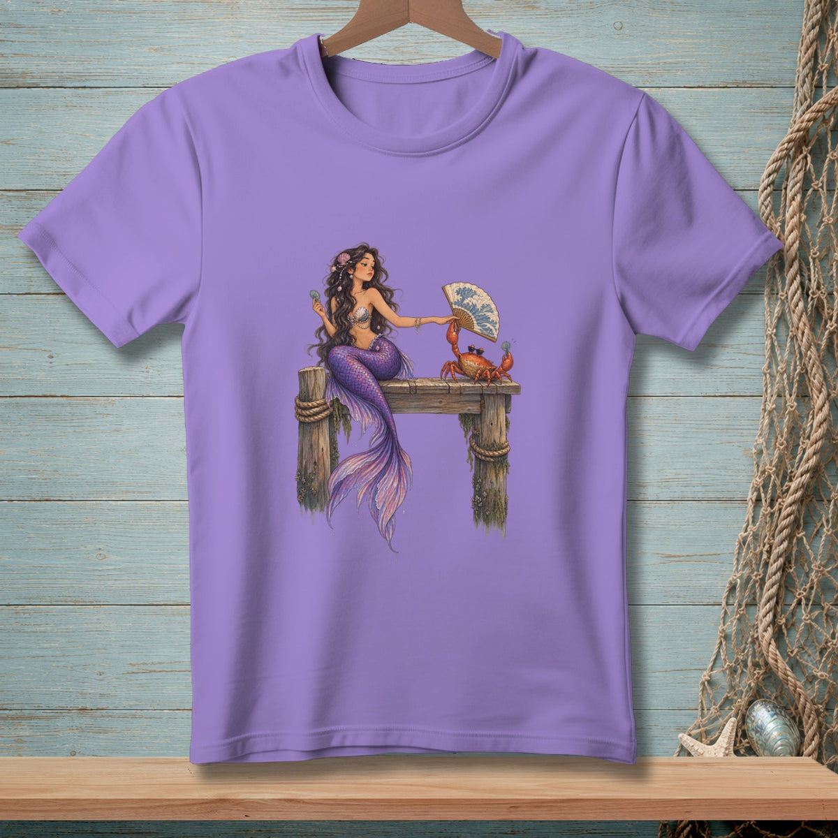 Mermaid with purple tail on a wooden pier with a crab holding a fan.