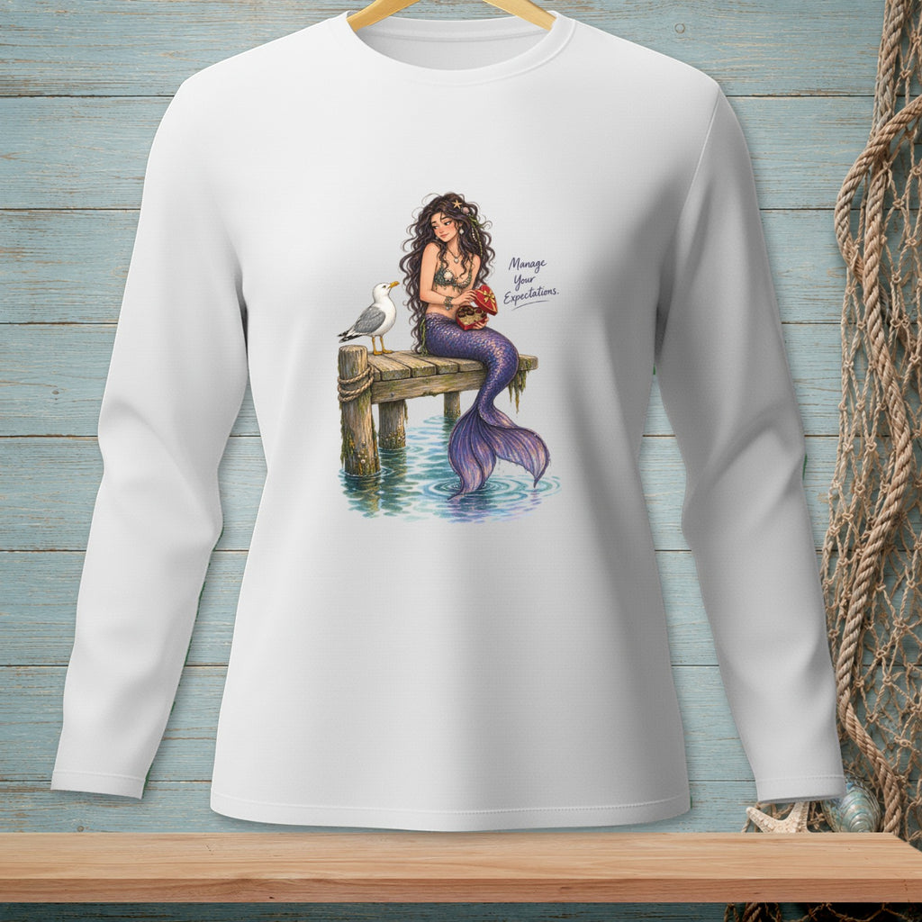 Illustration of a mermaid on a dock with a seagull, text "Manage Your Expectations."
