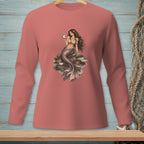 Pink long-sleeve shirt with a mermaid holding a pearl and sitting on rocks.