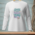 White long-sleeve shirt with "Sorry I'm on Mermaid Time" text design.