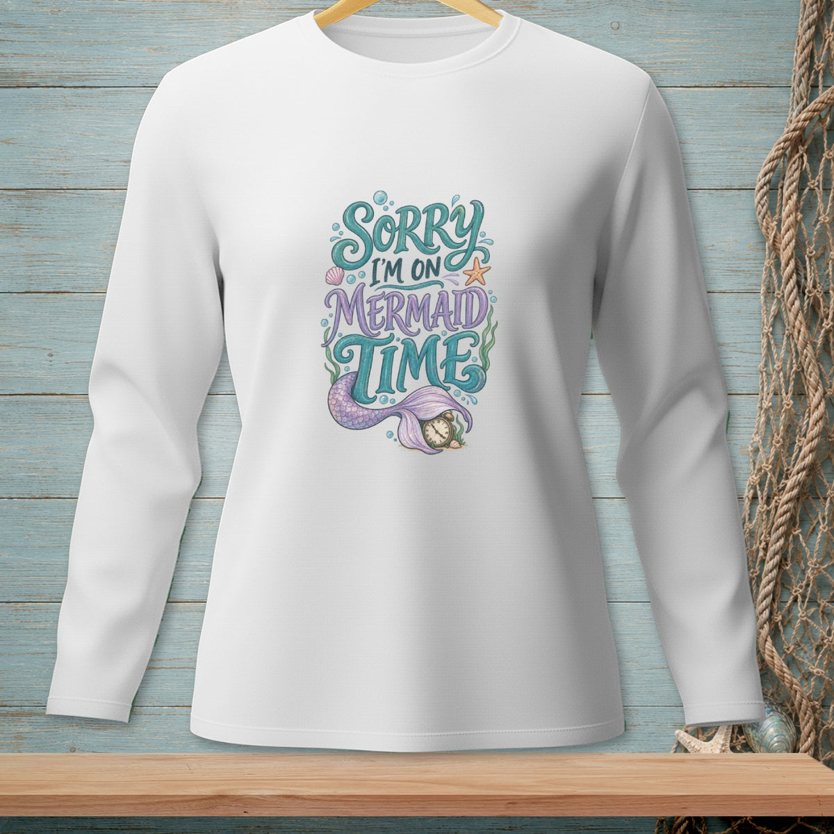 White long-sleeve shirt with "Sorry I'm on Mermaid Time" text design.