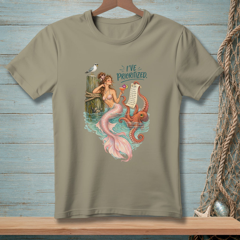 Mermaid holding a drink, octopus, and seagull with "I've Prioritized" text.
