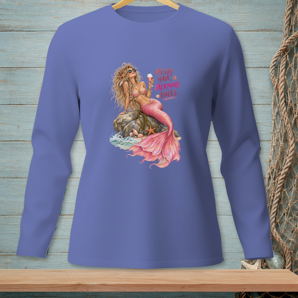 Purple long-sleeve shirt with a graphic of a mermaid and the text "Messy Hair Mermaid Rules."