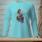 Turquoise long-sleeve shirt with a mermaid holding a cocktail on a rock.