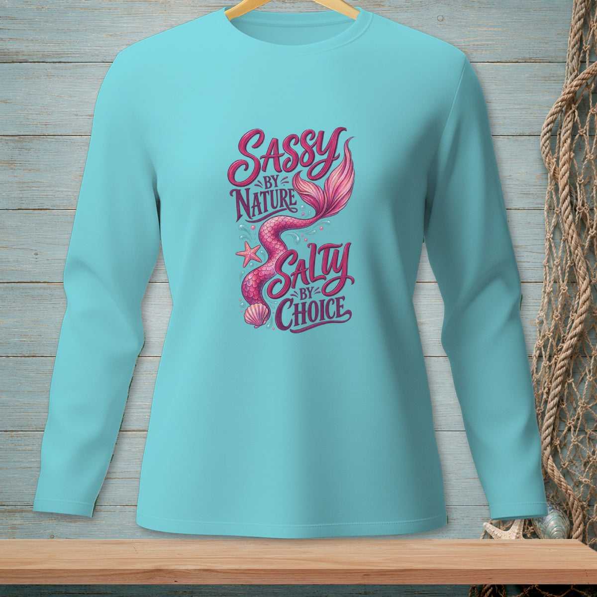 Aqua long-sleeve shirt with "Sassy by Nature Salty by Choice" and mermaid tail graphic.