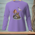 Mermaid sitting on a rock with a picnic basket as a seagull steals food.
