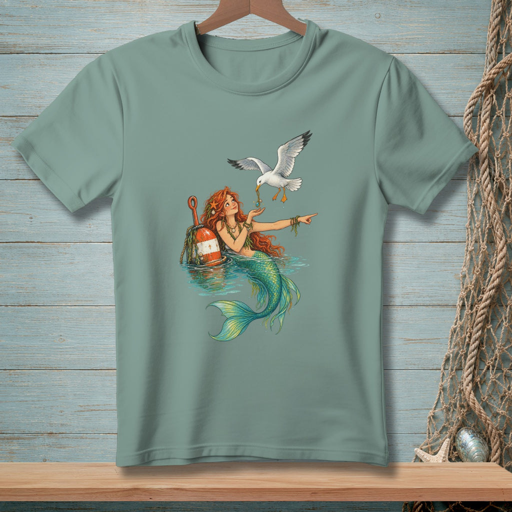 Mermaid with a seagull and orange buoy in the water.