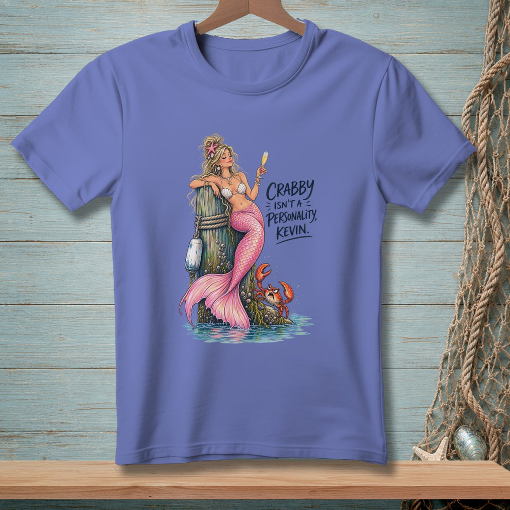 Mermaid with pink tail and a glass of champagne, text reads "Crabby isn't a personality, Kevin."