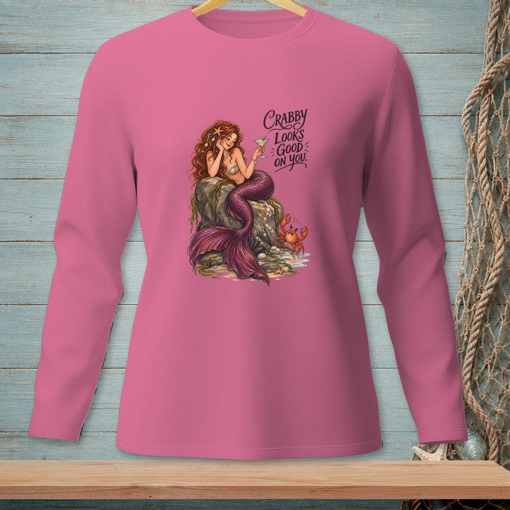 Pink long-sleeve shirt with a mermaid and crab graphic that reads "Crabby looks good on you."