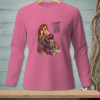 Pink long-sleeve shirt with a mermaid and crab graphic that reads "Crabby looks good on you."