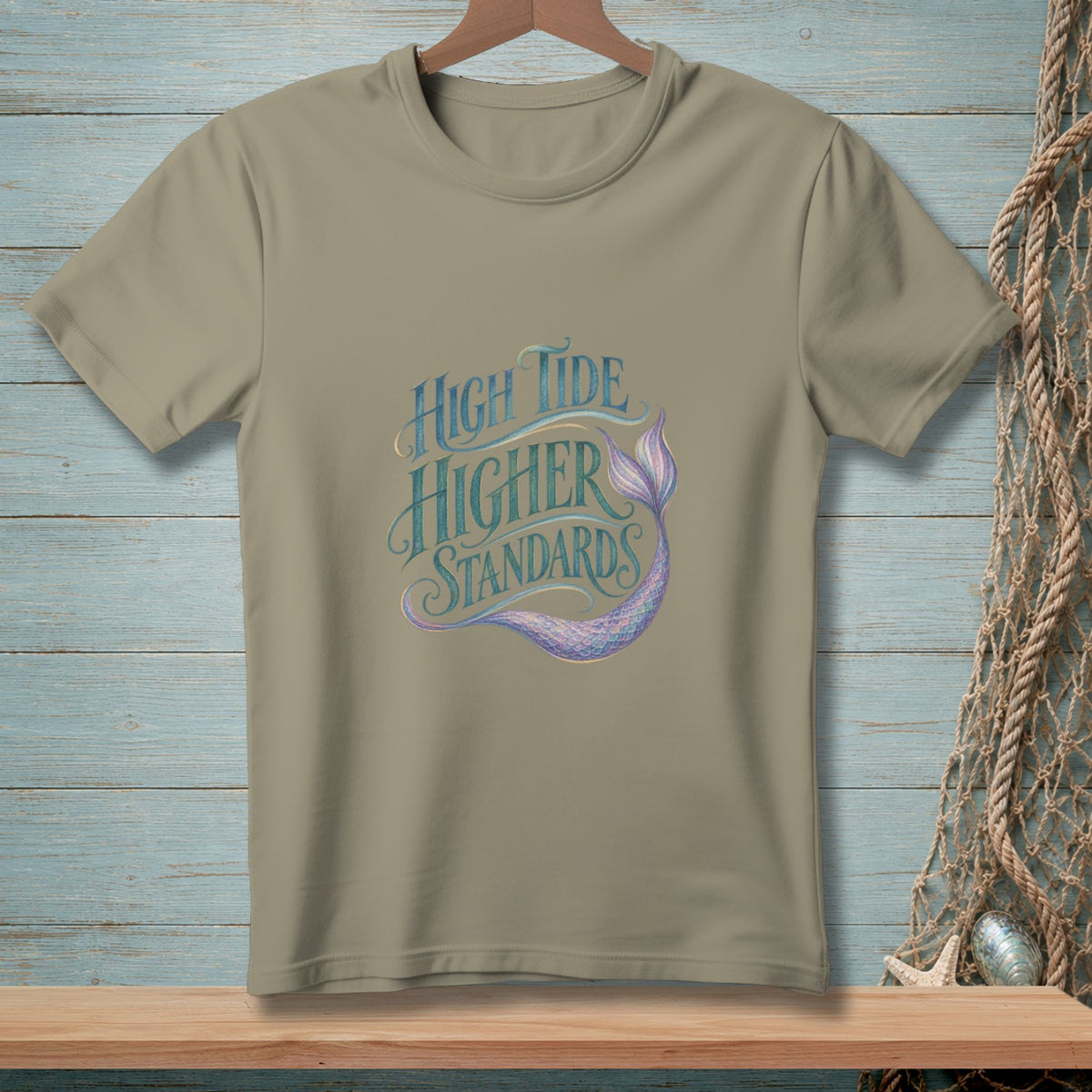 T-shirt with "High Tide Higher Standards" text and mermaid tail design.