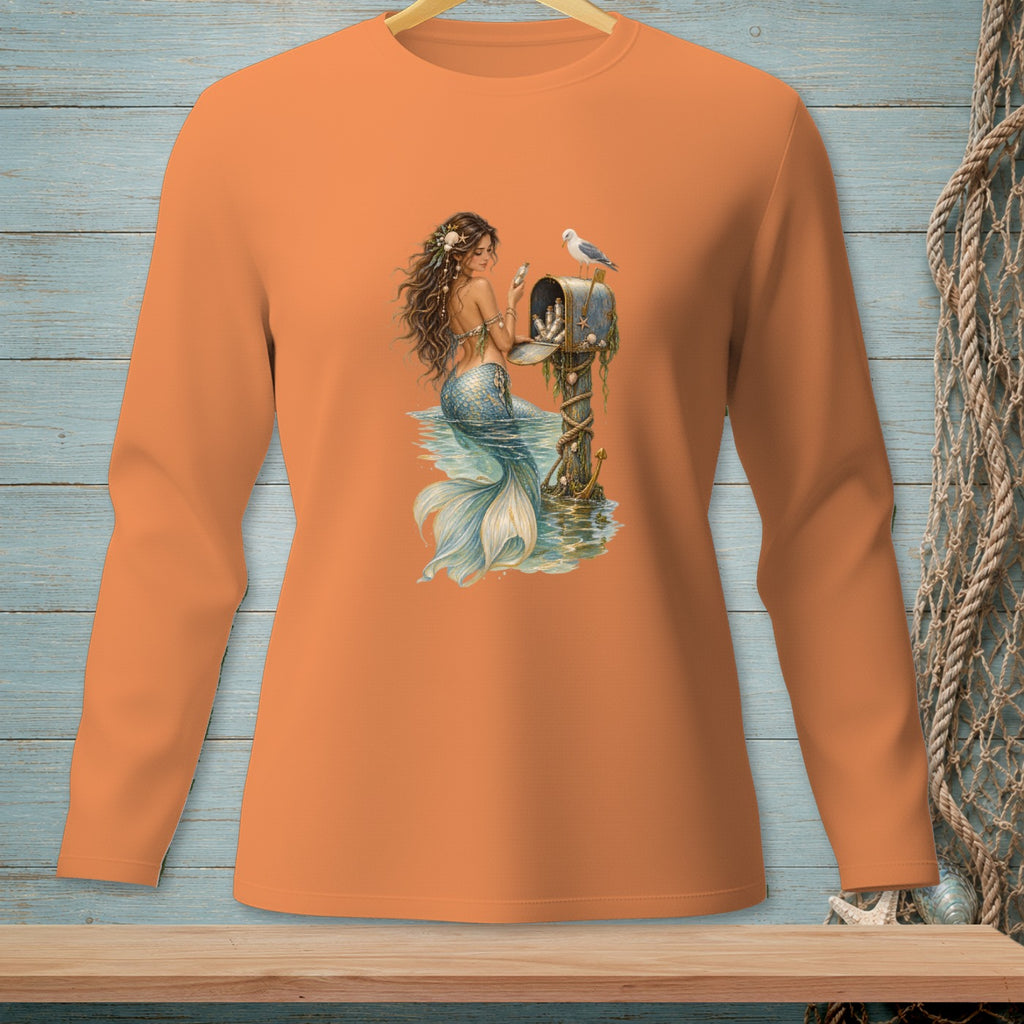 Orange long-sleeve shirt with a mermaid sitting by a nautical mailbox with a seagull.