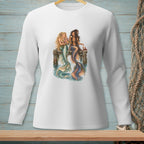 Two mermaids with colorful tails sit on a dock, one holding flowers.