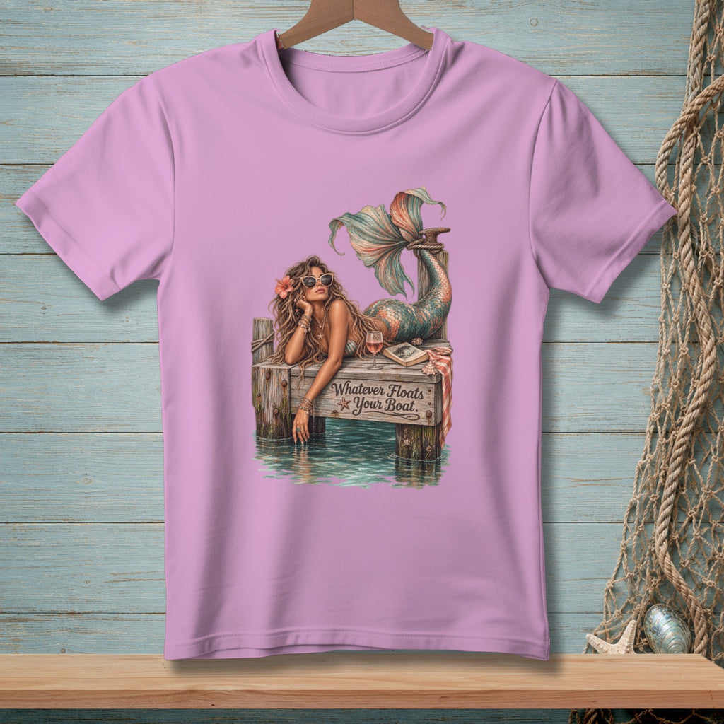Mermaid on dock with wine and book, text "Whatever Floats Your Boat."