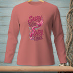 Coral long-sleeve shirt with mermaid and "Sassy by Nature Salty by Choice" text.