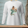 Mermaid with tail resting on cooler with lobster and drink in water.