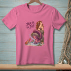 Pink t-shirt with mermaid and crab graphic, text "Talk to the tail."