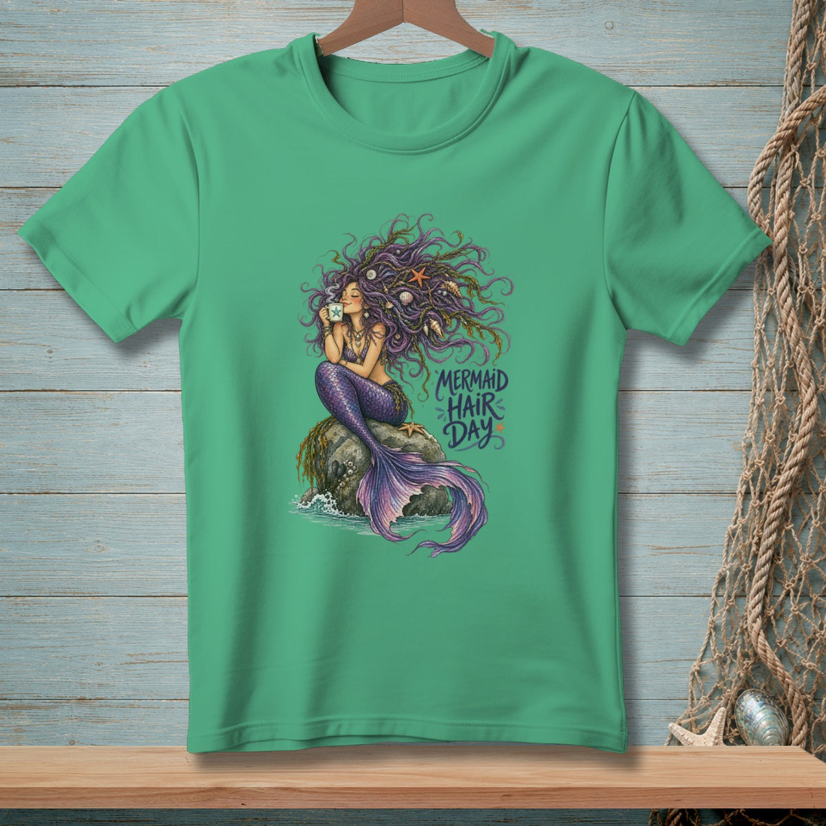 Green t-shirt with mermaid drinking coffee and "Mermaid Hair Day" text.