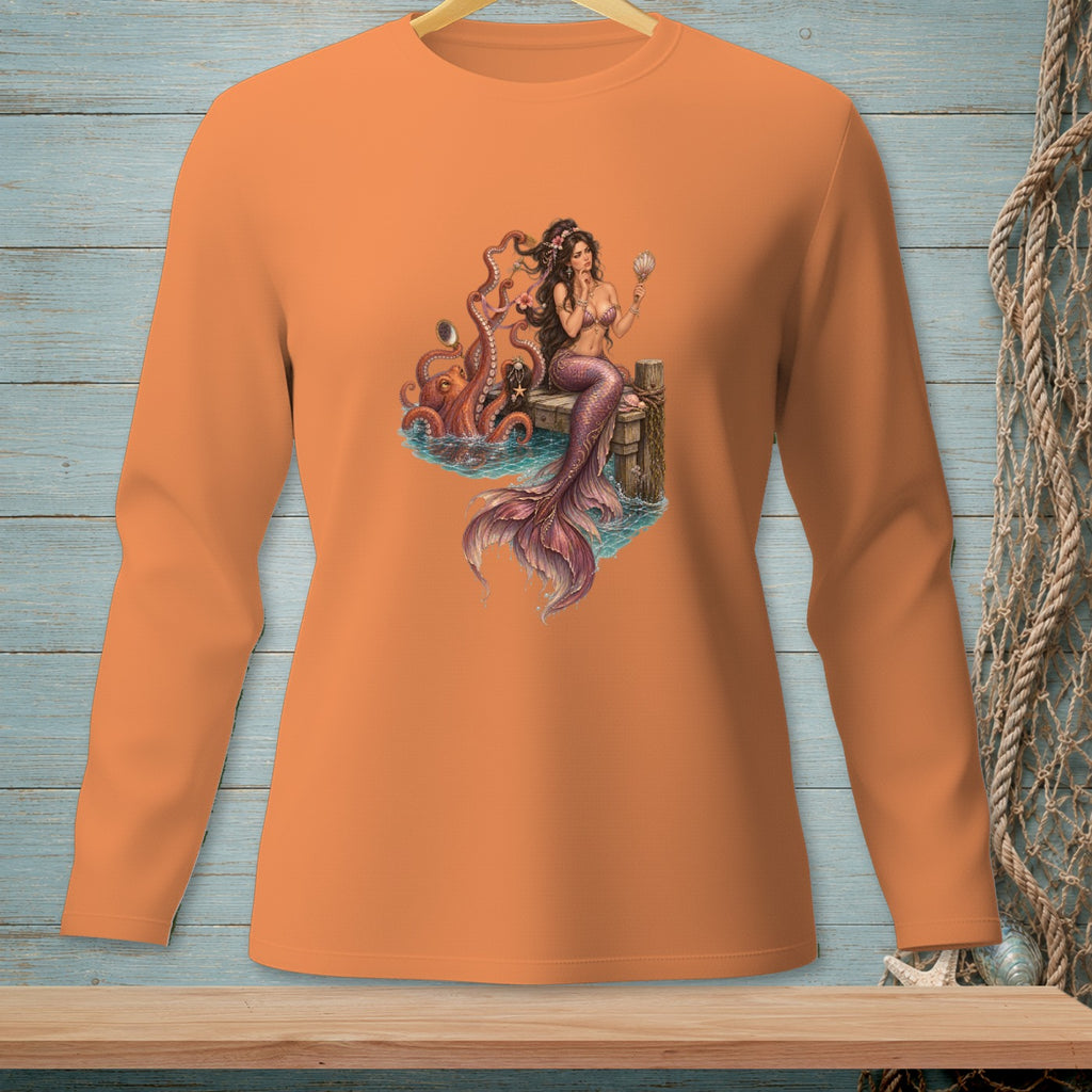 Orange long sleeve shirt with a mermaid and octopus graphic.