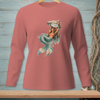 Mermaid with cocktail leans on sign reading ATTITUDE, on coral long sleeve shirt.