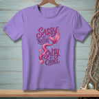 Purple t-shirt with "Sassy by Nature Salty by Choice" mermaid graphic.