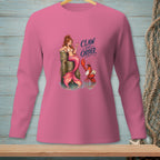 Mermaid with cocktail and lobster with gavel on pink long-sleeve shirt, text "Claw and Order".