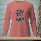 Peach long-sleeve shirt with "Zero Fins Given" text and mermaid tail graphic.