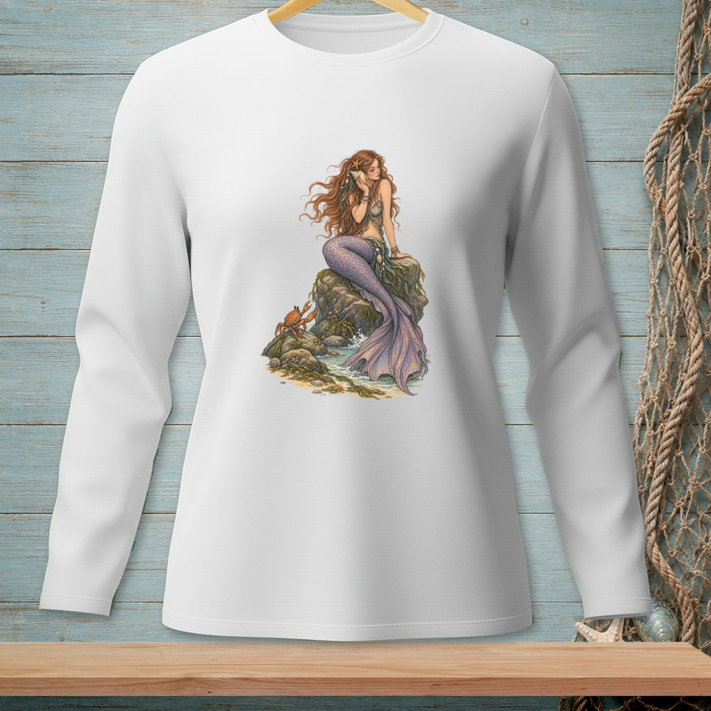 White long-sleeve shirt with a mermaid sitting on rocks with a crab.