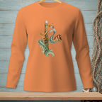 Orange long-sleeve shirt with two mermaids and a nautical theme graphic.