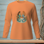 Two mermaids sitting on a dock, talking with tails in the water.