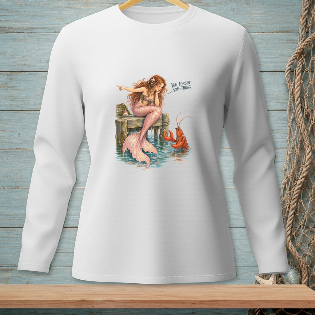 Mermaid sitting on a dock points to a lobster with text "You Forgot Something."